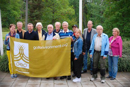 Head Greenkeeper Jonas Liljeblad (third from left) and his the team at Nacka Golfklubb receive the GEO Certified™ flag from Maria Strandberg, Director of Research & Development, Swedish Golf Federation (left), and Mårten Wallberg, GEOSA, Accredited Verifier (second left).