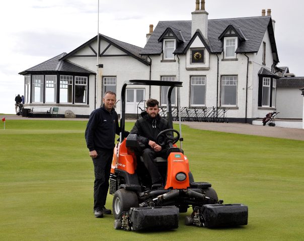 Robert Patterson, left, with Mark Mclaren assistant green keeper, in front of the Royal Aberdeen clubhouse.